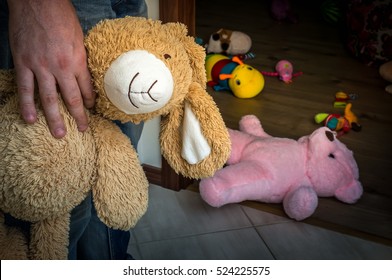 Pedophile with cuddly toy trying to steal child - kidnapping concept