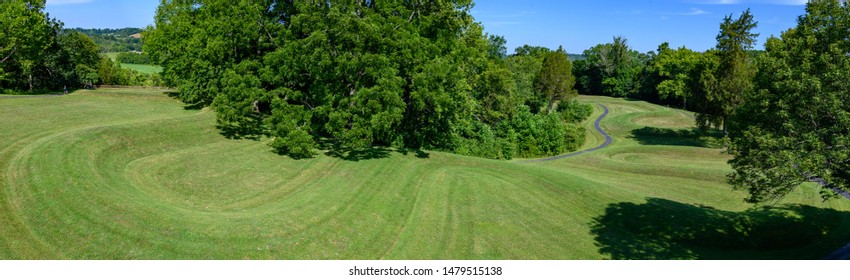 Peebles, Ohio / United States - August 4, 2019:  The Great Serpent Mound Prehistoric Adena Native American Effigy In Summer