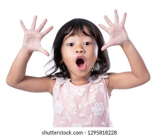 Peekaboo. Portrait Of Young Toddler Showing Peek A Boo Gesture