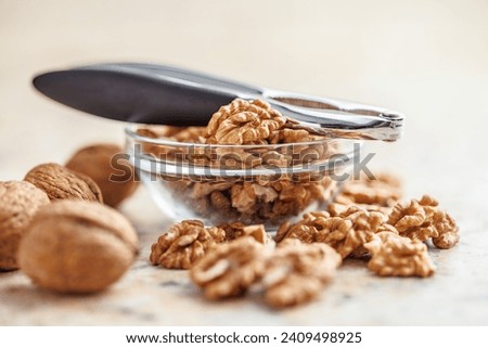 Peeled dried walnut kernels in the bowl.