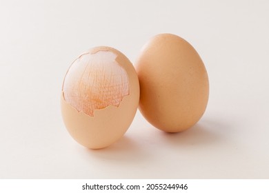 Peeled Egg Shell Expose The Egg Membrane On White Background.