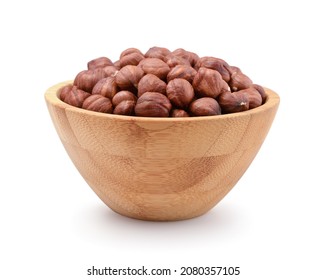 Peeled hazelnuts in a wooden bowl isolated on white.Front view. - Powered by Shutterstock