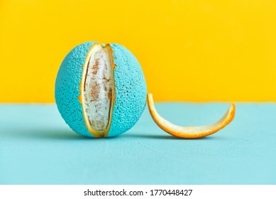 Peeled Lobule Peel Of An Orange Painted In Turquoise Color. Creative Design Concept