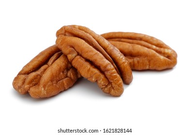 Peeled pecan nuts isolated on white background