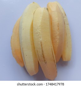 Peeled Plantain On A White Background Ready For Cooking.