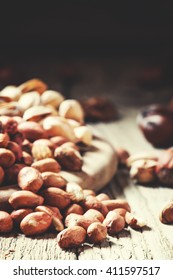 Peeled raw peanuts, nut mix, healthy eating, selective focus - Shutterstock ID 411597517