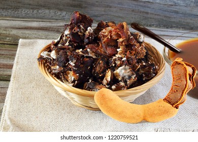 Peeled Tamarind With Tamarind Water Concentrate Chutney Pulp Or Paste Top View