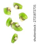 Peeled triangular kiwi slices fall through space. Isolated on white.