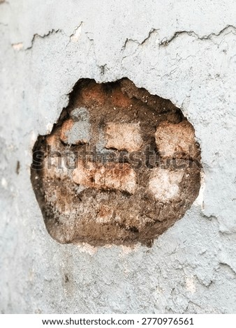 Peeling brick wall texture with warm evening light background
