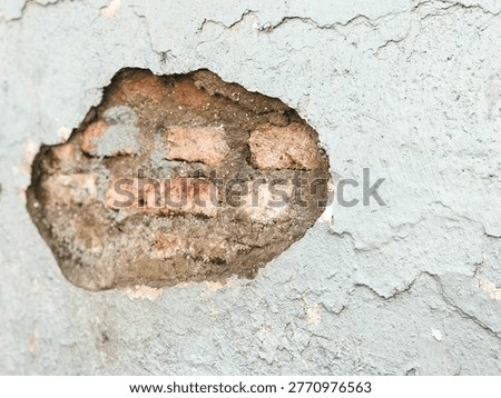 Peeling brick wall texture with warm evening light background