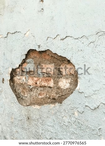 Peeling brick wall texture with warm evening light background