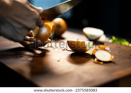Peeling The Onion. The Process Of Cleaning The Onion Peel Layer By Layer. Hands Are Peeling Onion Close Up