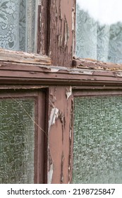 Peeling Paint On An Old Wooden Window