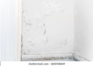 Peeling Wall Paint, Moist Damp Texture On House Wall With Some Water Stain And Leaks