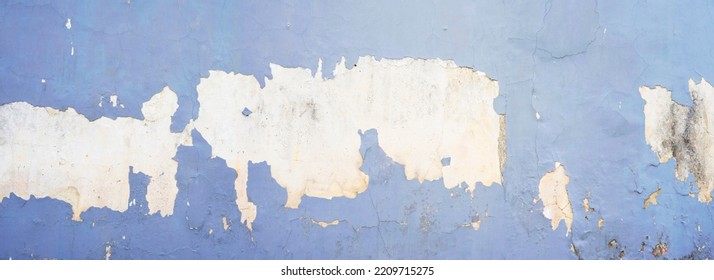 Peeling wall texture for background and wallpaper. Abstract rough wall pattern panoramic dimensions.