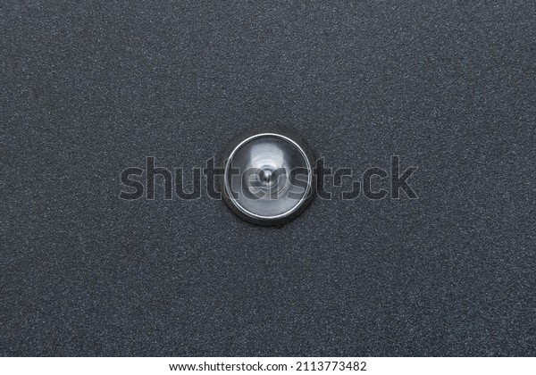 Peephole door eye look hole from spy security,\
safety close-up.