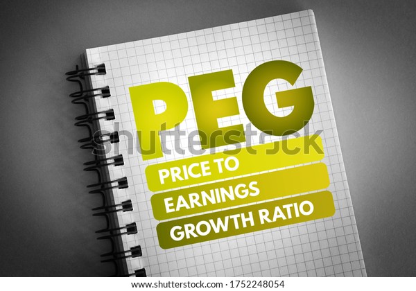 PEG Price to\
Earnings Growth ratio - valuation metric for determining the\
relative trade-off between the price of a stock, the earnings\
generated per share, acronym text on\
notepad
