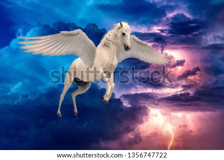 Pegasus winged legendary white horse flying with spread wings in stormy sky