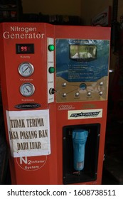 Pekalongan / Indonesia - 05 January 2020: Red Nitrogen Generators To Add Wind To The Motorcycle Bank In The Workshop