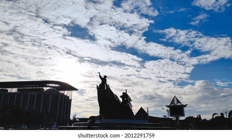 Pekanbaru, Indonesia - April 11 2021: Silhouette of a statue depicts  one of iconic traditional dance in Riau, Pekanbaru, named Zapin dance