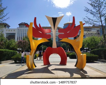 Peking Opera Face Sculpture in front of Chang'an Grand Theatre，August 28, 2019, Beijing, China