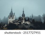 Peles Castle from Romania covered by fog 