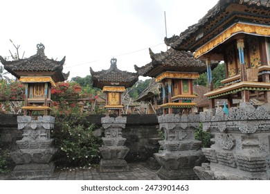 Pelinggih often feature intricate architectural designs, adorned with ornate carvings and decorations, reflecting the rich cultural and religious traditions of Bali. - Powered by Shutterstock