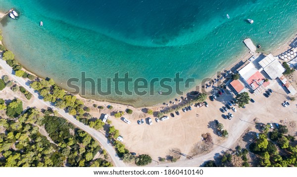 Peloponnese, Greece Aerial view on turquoise blue water and sandy beach. Turquoise wallpaper for walls. 