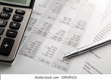 Pen, calculator On the financial account documents. Financial concept - Shutterstock ID 539539213