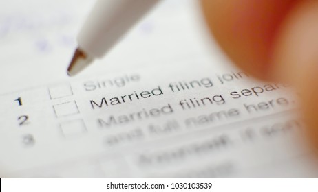 Pen And Checkbox In Blank Tax Form. Focus On Married Filing Jointly Status