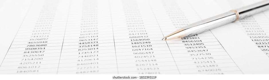 Pen with Financial accounting graphs. Finance, business and accounting concept. - Shutterstock ID 1832393119