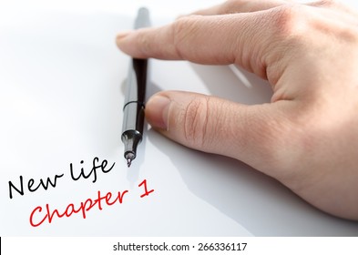 Pen in the hand isolated over white background and text concept new life chapter 1