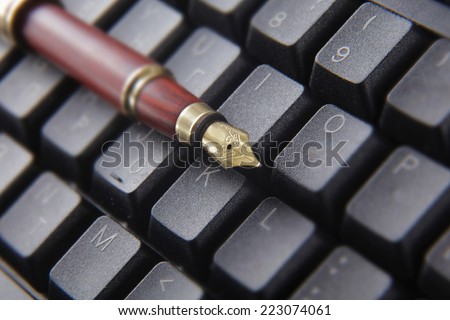 Pen on a computer keyboard