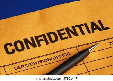 Pen On The Confidential Envelope Isolated On Blue