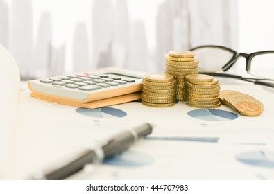 Pen On Financial Report With Calculator, Money On Table Of Investor. 