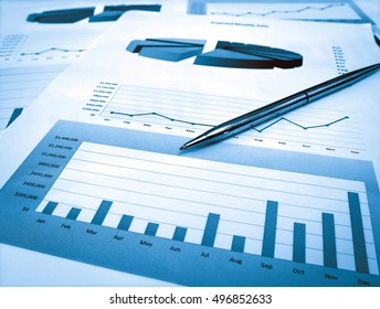 Pen on the investment Chart - Shutterstock ID 496852633