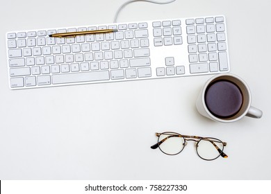 Pen On Keyboard Coffee Glasses White Desk From Above Top Down Overhead Flat Room For Text Minimal