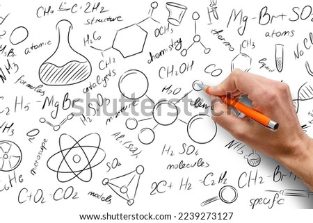 Similar – Chemiker und mathematische Zeichnungen auf Tafelhintergrund