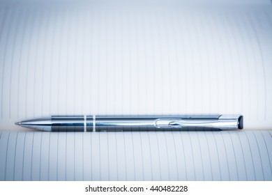Pen on notebook