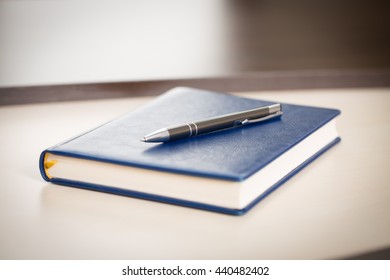 pen on notebook