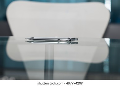 A pen on the table