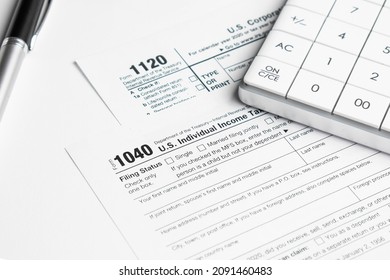 Pen On US TAX Form Background. Tax Day Concept