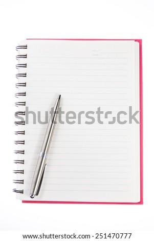 pen over note book on white background
