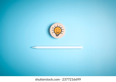 Pen or pencil with light bulb icon on wood label for start new ideas and learning education and graduation concepts. Knowledge of creative thinking and problem solution solving in tactic strategy.