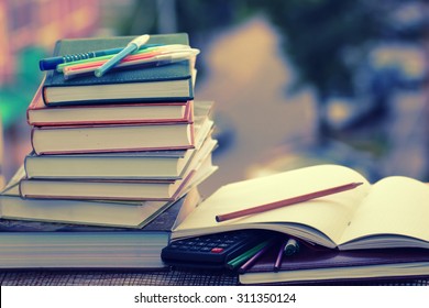 pen pencil study textbooks - Shutterstock ID 311350124