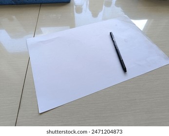 a pen and a piece of paper for documents or notes