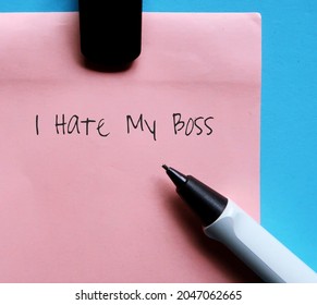 Pen And Pink Note With Text Wriiten I HATE MY BOSS, Concept Of Having Toxic Bad Boss Who Make Life In Workplace Miserable, Stressed, Depressed, Unable To Do Good Work.