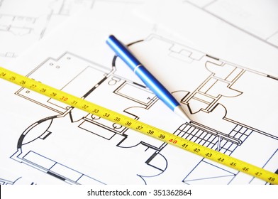 Pen And Ruler On A Floor Plan