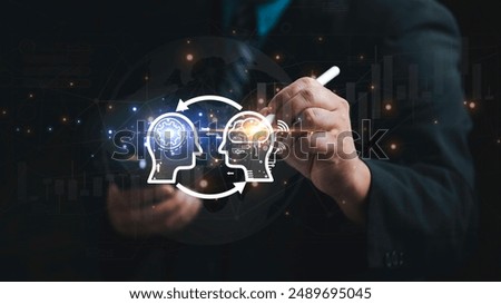 
A pen writes notes in a virtual person's brain. Then send the information to the robot's brain. to copy data from the original The concept of passing on business experience to the next generation.