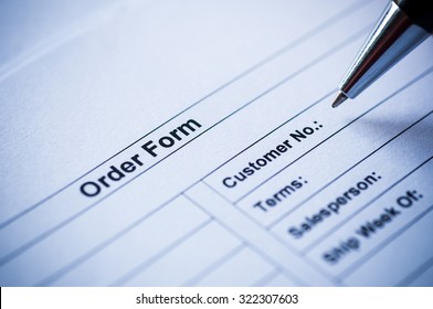 Pen Writing On Order Form.